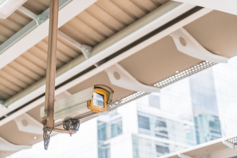 An AI supported security camera is surveying a construction jobsite for any anomalies